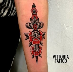 dagger tattoo and rose