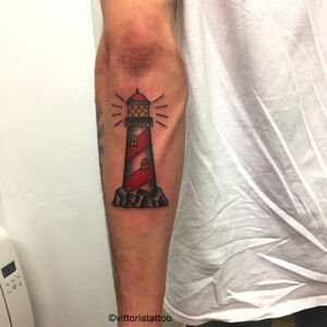old school small lighthouse tattoo