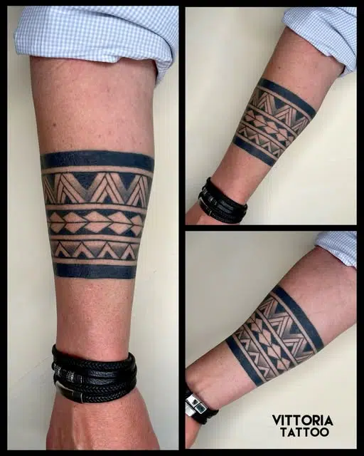 Tatouage bracelet style maori sur un avant-bras – motifs tribaux polynésiens réalisé par vittoria tattoo (23 creuse)