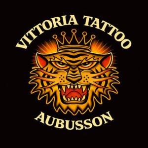 Logo Vittoria Tattoo Aubusson avec tête de tigre couronnée style tatouage traditionnel